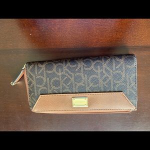 Brown Calvin Klein zip around wallet